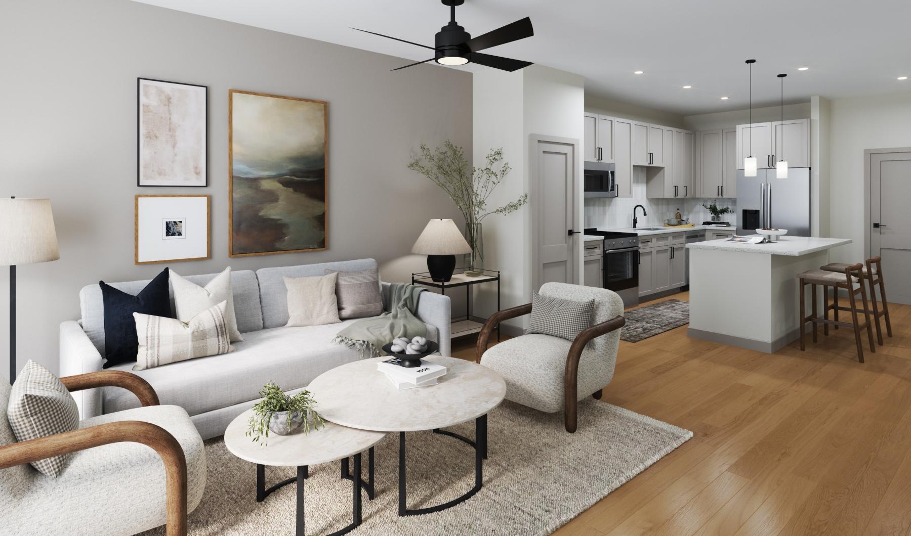 a living room with a white couch and a table